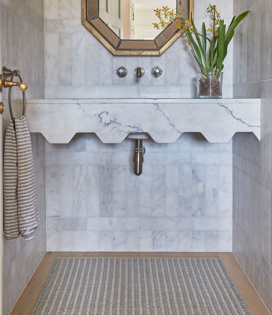 striped rug under sink
