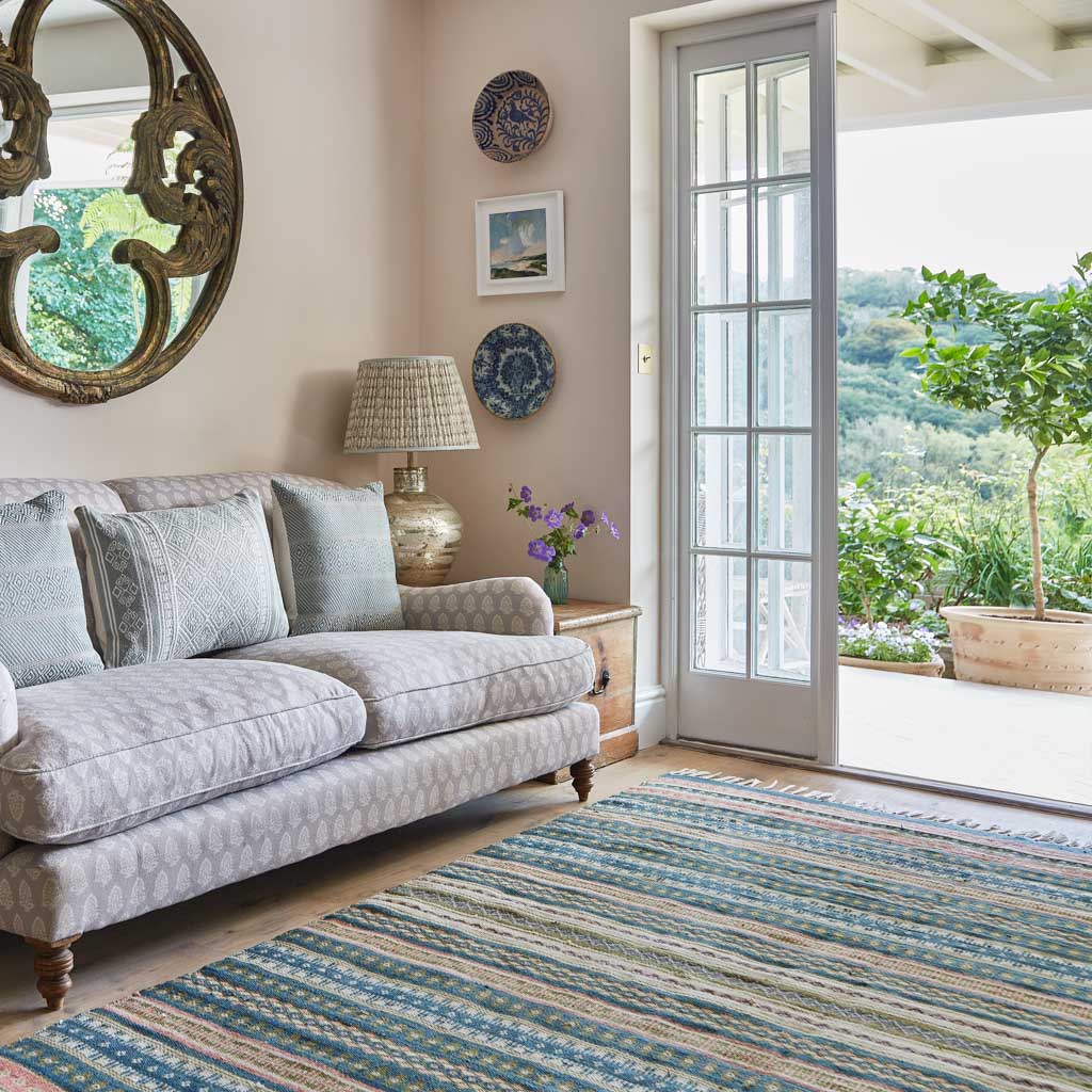 a striped rug in a living room