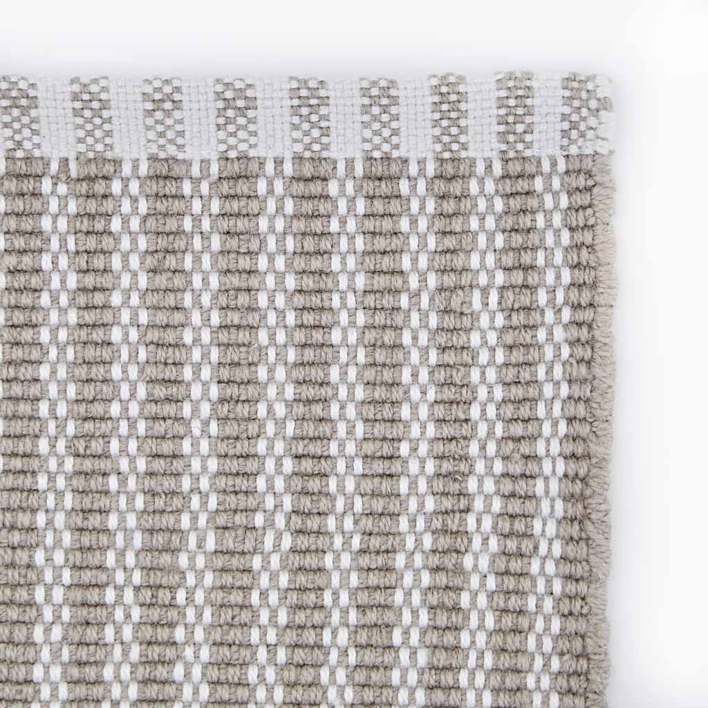 striped chinchilla rug corner
