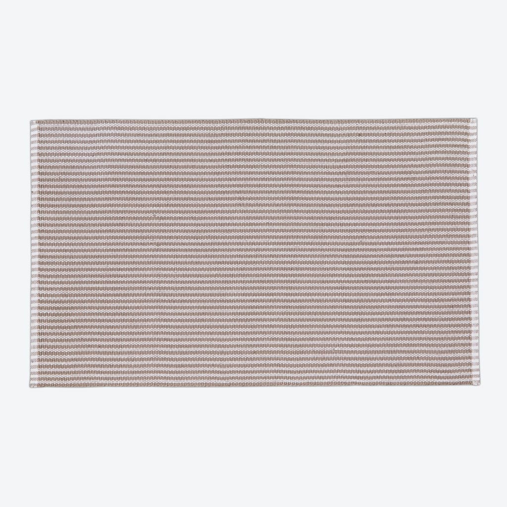 beige striped rug
