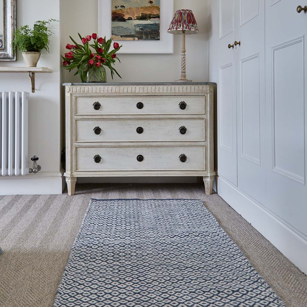 thistle navy rug in bedroom 