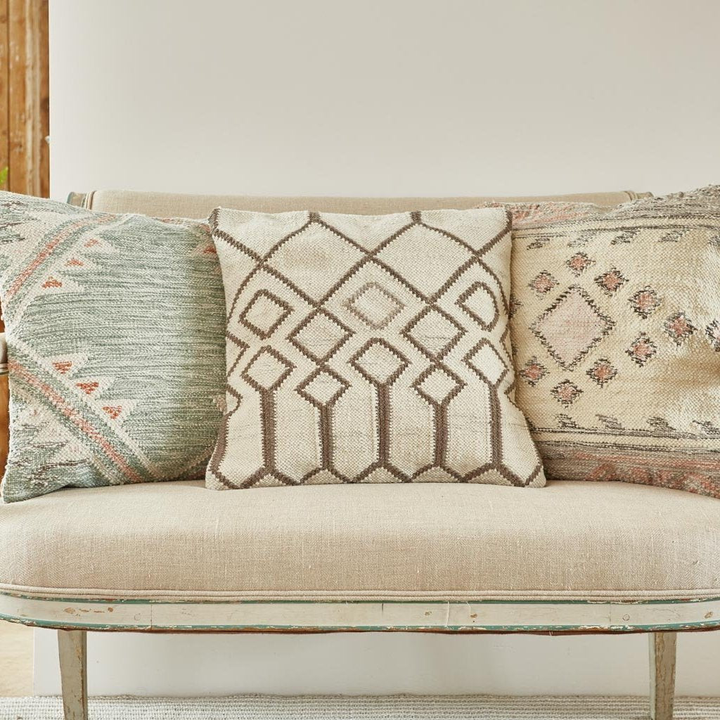 Medina Tangier cushion on bench seat with Andalucia Paloma and Cadiz cushions