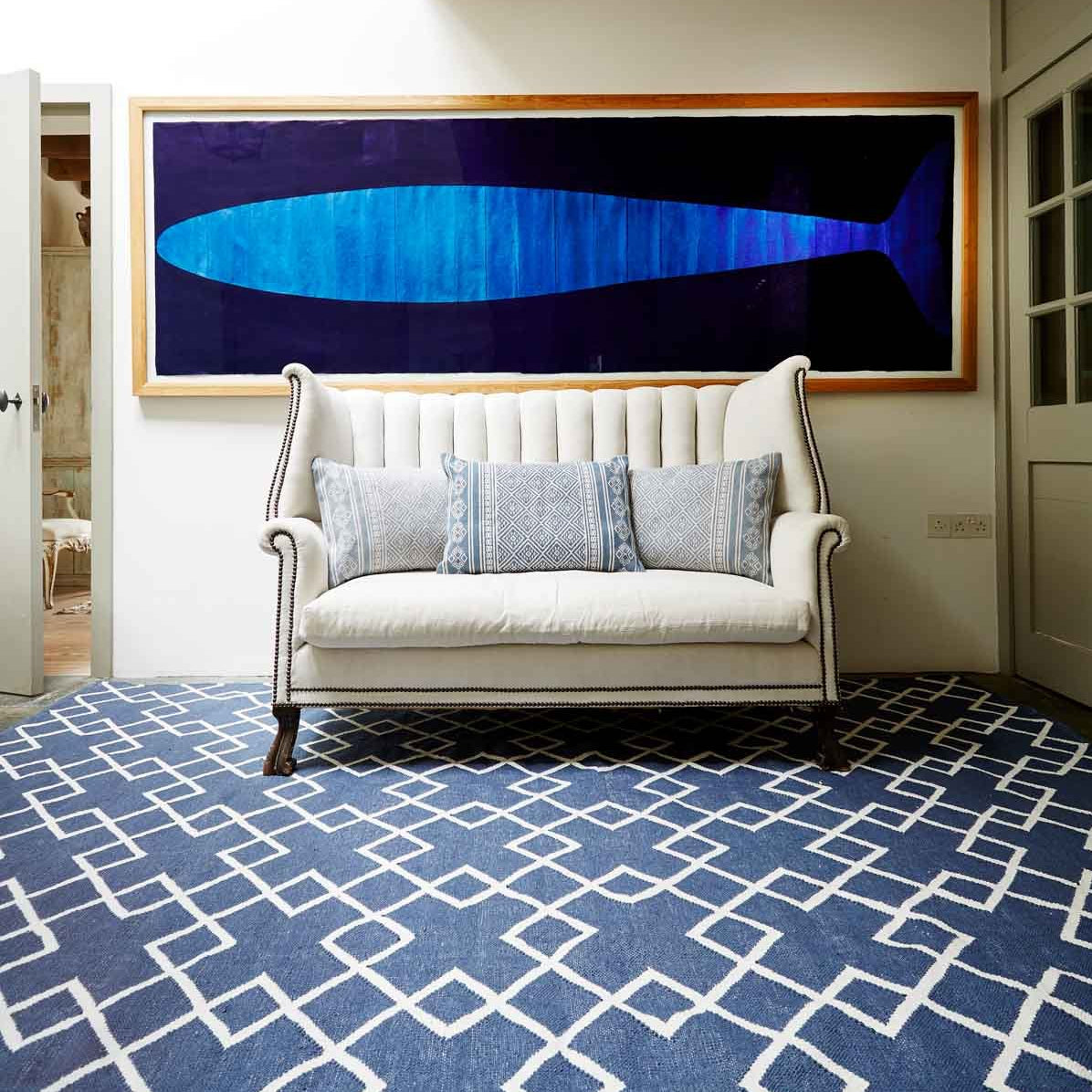 Navy Juno Rug with sofa