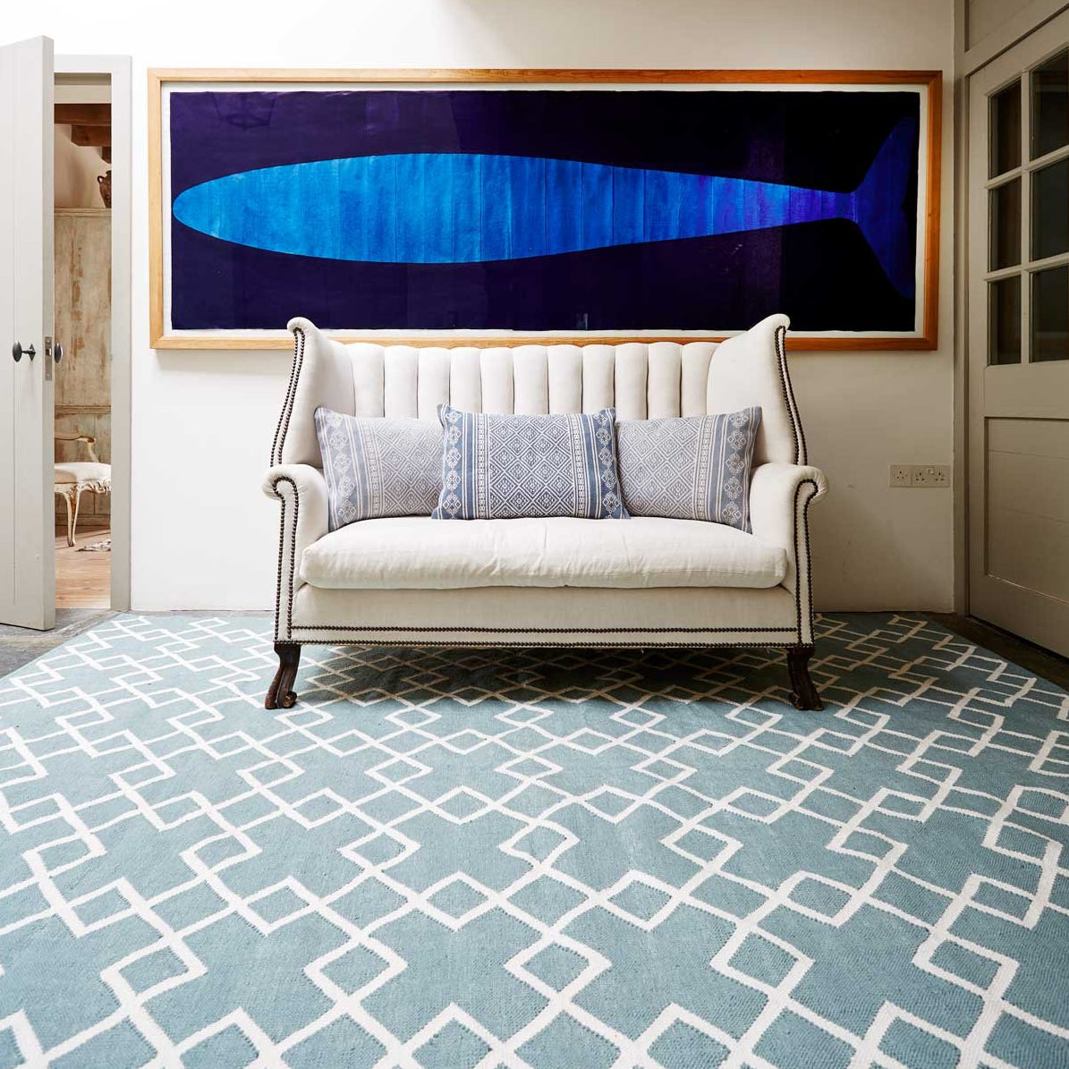 Teal Juno Rug with sofa