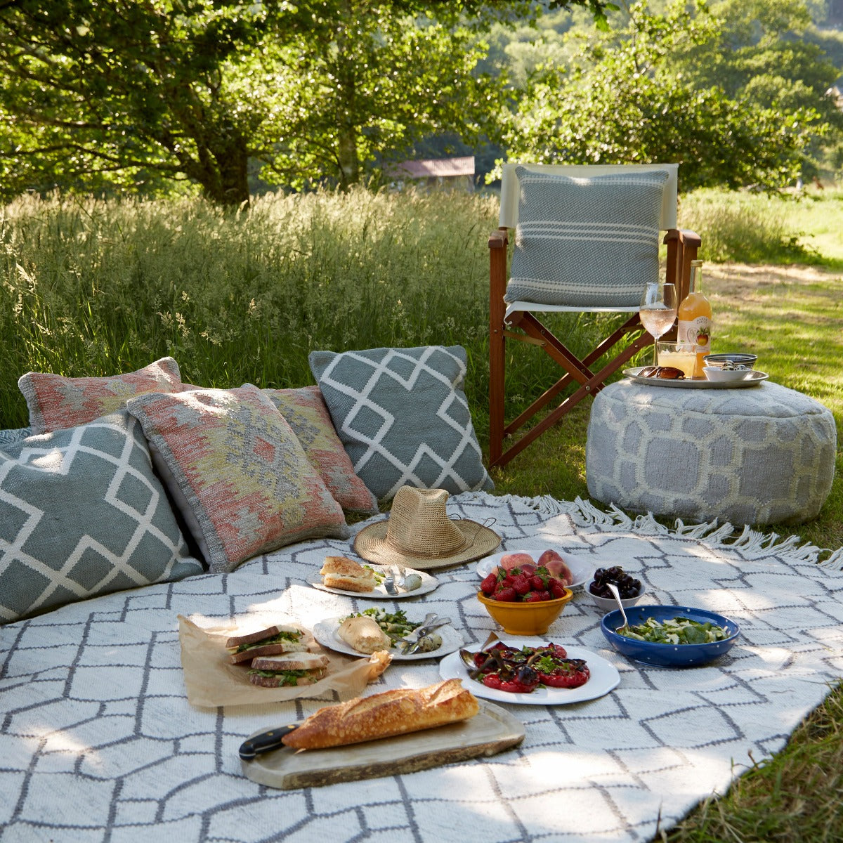 Medina Tangier Rug with Weaver Green cushions outdoors