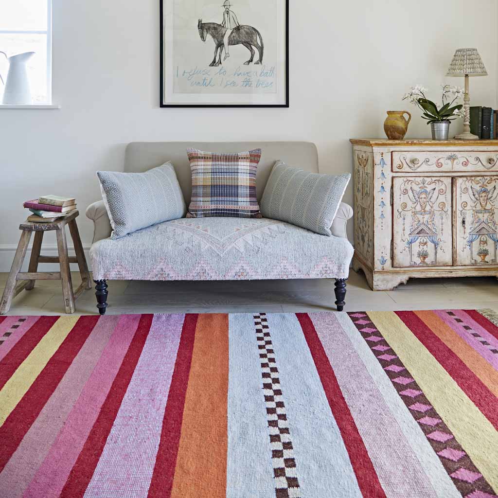 Bright striped rug in the living room.